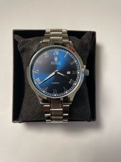Blue and silver watch with Roman numerals