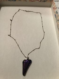 Necklace with purple pendant