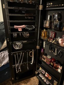 Body mirror with jewelry box inside