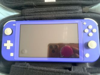 Nintendo Switch Lite Blue Bundle + 4 Games, & Case