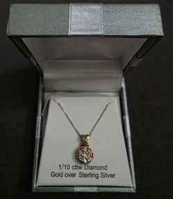 Diamond and gold over sterling silver chain and pendant