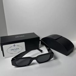 All black Prada glasses