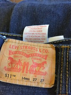511 Levi jeans 14 regular small hole in knee