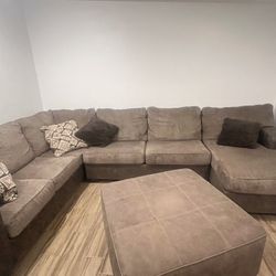 Brown couch with ottoman 