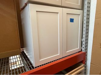 Upper white kitchen cabinets 30”
