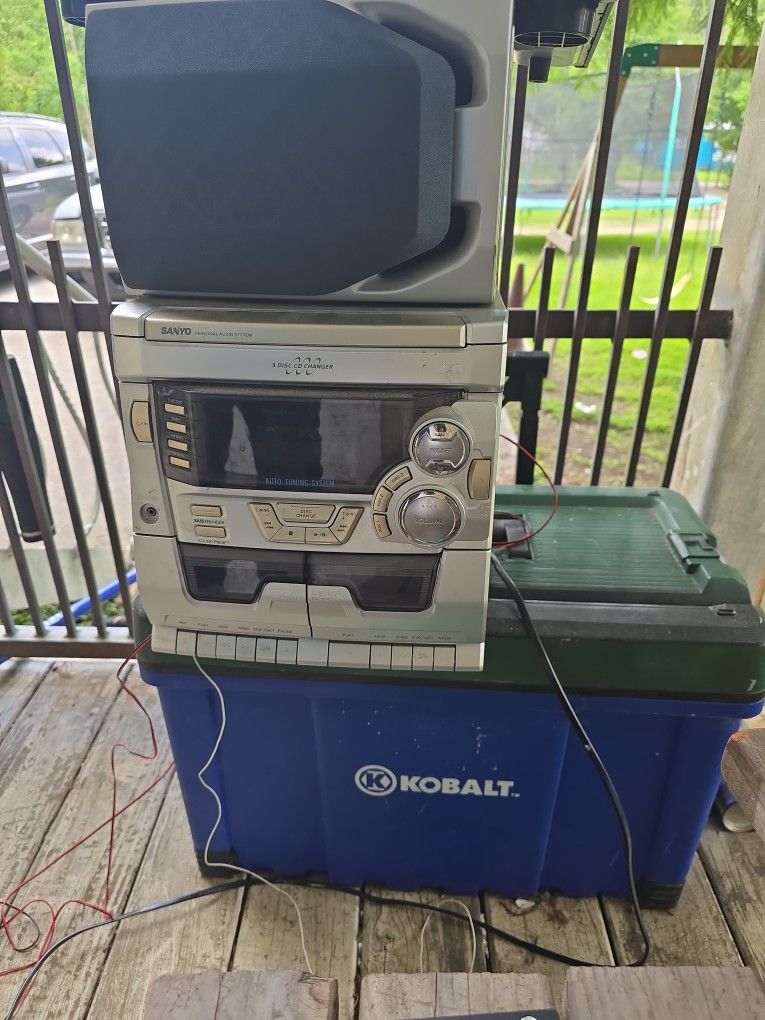 Sanyo Radio With Cd And Tape Player And A Pioneer Digital Signal Prossesor