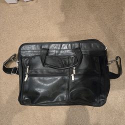 Leather Exapandable Messenger bag with dividers.