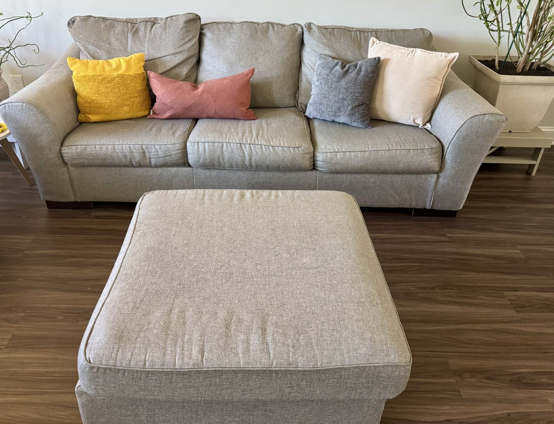Three Piece Gray Sofa and Ottoman Set