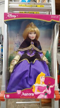 For sell, Disney princess Aurora porcelain keepsake doll.