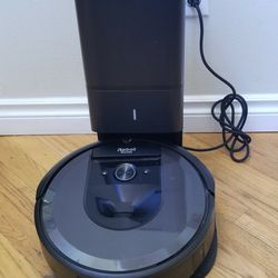 NEW cond ROBOT  ROMBA VACUUM WITH AMAZING POWER SUCTION. , WORKS EXCELLENT. , IN THE BOX 