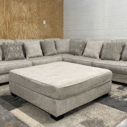 Ashley Rawcliffe 3 Piece Sectional with Oversized Ottoman
