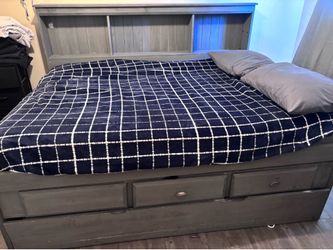 Full bed frame with headboard and trundle (mattresses not included)