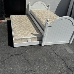 Twin size bed with trundle