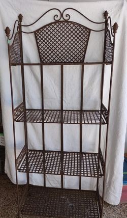 Wrought iron shelf unit used in Warrenville