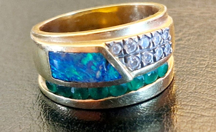 18k Gold Ring with opal, diamonds and emeralds
