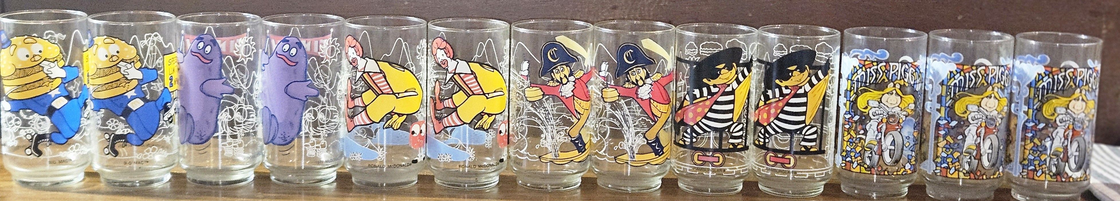 ORIGINAL MCDONALD'S CHARACTER GLASSES 10 IF THEM ARE THE ORIGINAL 1977 GLASSES AND 3 OF THEM ARE THE 1981 ORIGINAL GLASSES