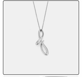 Tiffany and Co Elsa Peretti initial “F” pendant