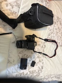 Canon EOS Rebel T6 DSLR Camera + 18-55mm Lens