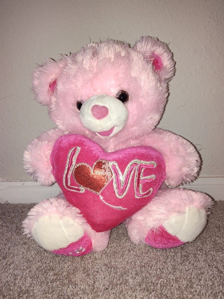 Pink teddy bear with heart