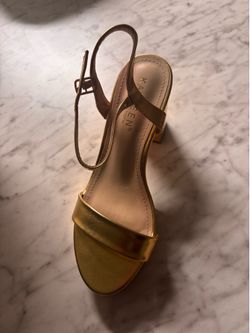 Gold high heels