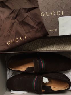 GUCCI loafers, with original boutique receipt , box and travel  bag.