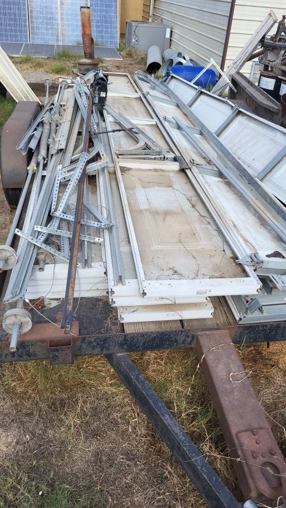 3) Sets Electric Garage Doors Openers 