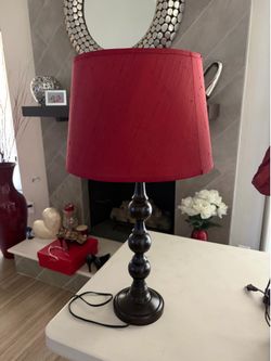 Red lamp shade with dark brown base