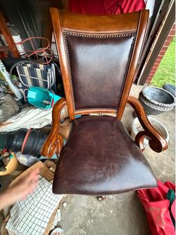 OFFICE CHAIR, brown. 23"w x 23"deep; cross streets are Arapaho & Waterview