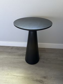 Two black side / accent tables