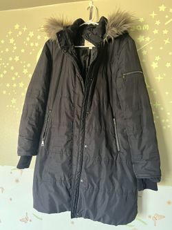 Woman‘s coat. sweaters. boots