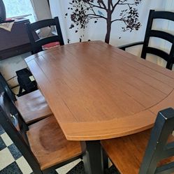 Elegant dining room table, I believe it's mahogany and or cherry