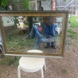 a pretty mirror its 30 inches tall and 41 inches wide 
