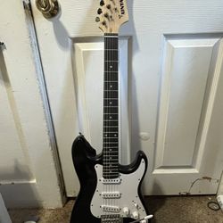 Black Xinyan electric guitar