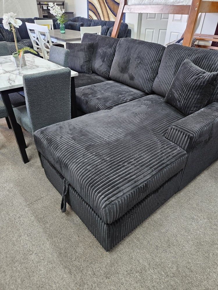 New sectional with pullobed and storage $899
