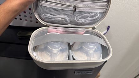 Momcozy with new born diapers and 1 month
