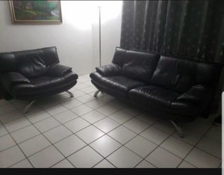 Living room set( love seat and couch) leather