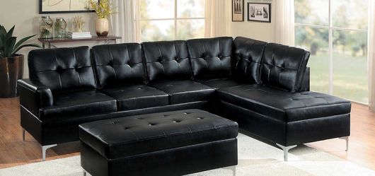Black sectional (ottoman can be added for extra)