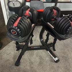 Like New Bowflex 552 adjustable dumbbells with media stand