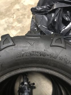 4 wheeler tire for the front and back a lot of tread left