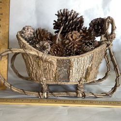 Wood Sleigh Filled With Pine Cones