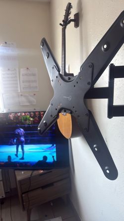 Full-Motion Adjustable TV Wall Mount – $25