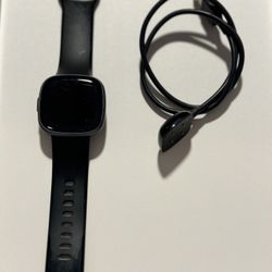 Fitness Upgrade Alert: All-Black Versa 4 Fitbit Watch with Free Charger!