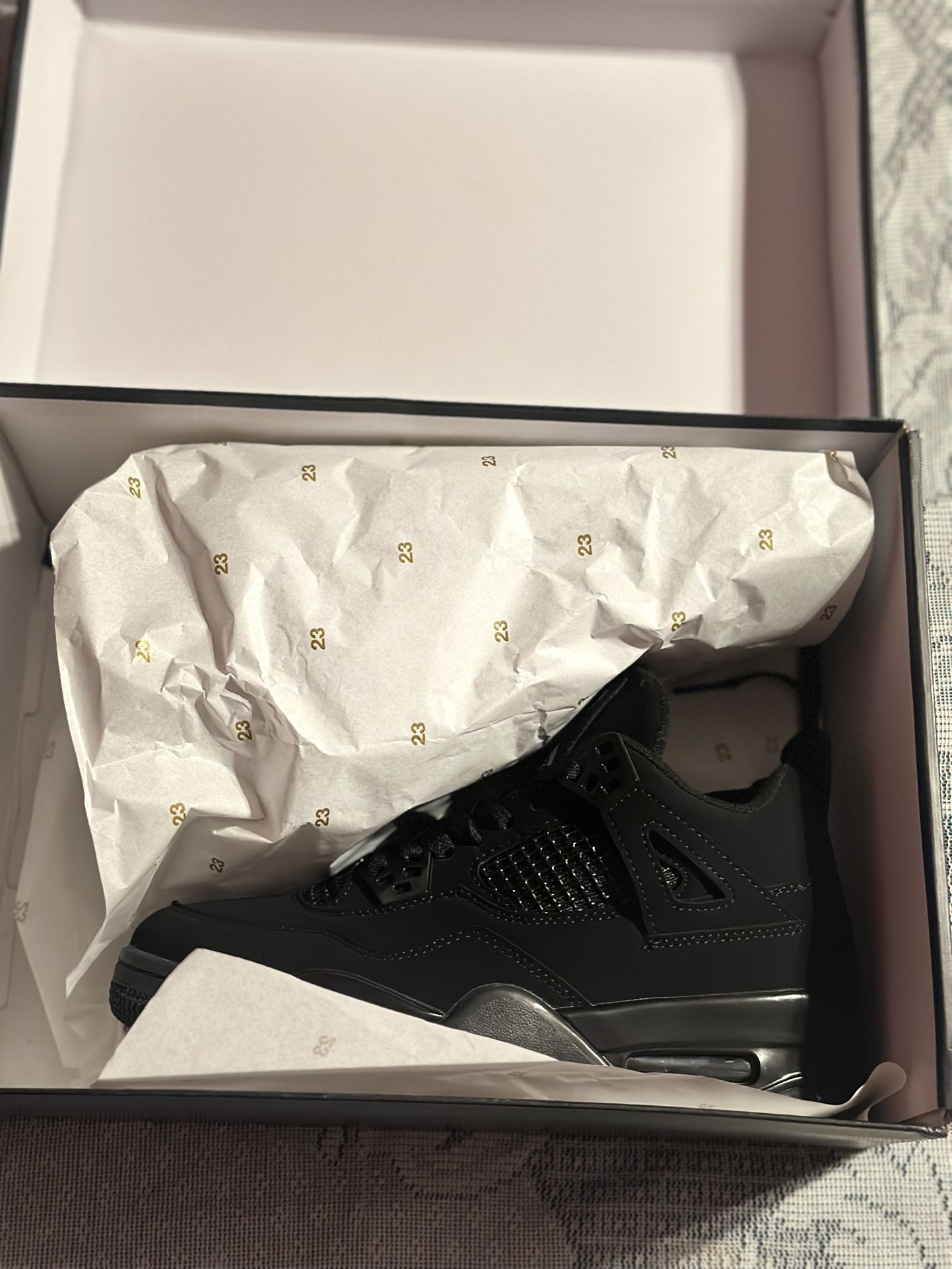 Black Cat Jordan 4