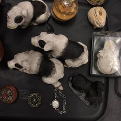 Antique bear, pig, snow, globes, and some antique medicine containers