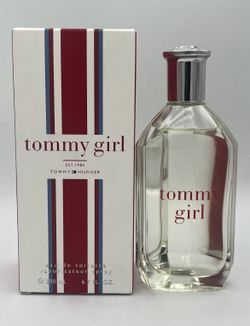 Tommy Hilfiger Eau De Toilette Spray 6.7 Fl. oz. 200 MI. Girl About 95% Full Bottle.