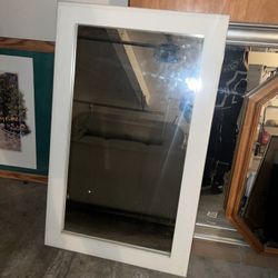 large rectangle mirror with white frame 