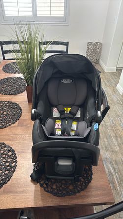 Graco snug ride snug fit car seat & base