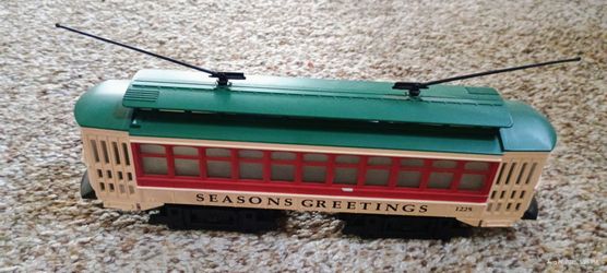 Vintage Railroad Train Industrial Rail Seasons Greetings Holiday Trolley (#1225), an O/O-27 scale motorized streetcar originally produced by Industria