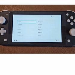 Nintendo Switch Lite Great Condition With 4 Games 