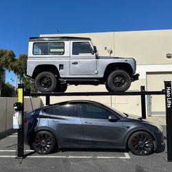 New 9,000 lbs Capacity 4 post Car Lift. Moveable. With 2 YEAR WARRANTY